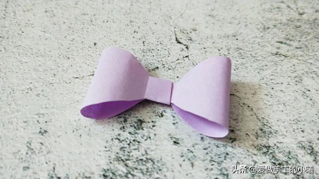 礼品盒上的蝴蝶结折法,圆形礼物盒蝴蝶结的系法图解