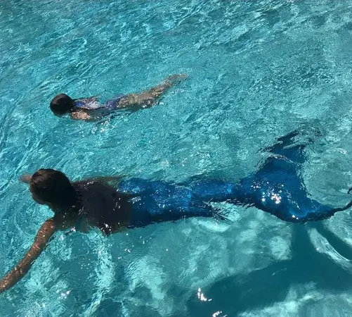 ** Beckham shared photos of Harper playing in the water. In particular ...