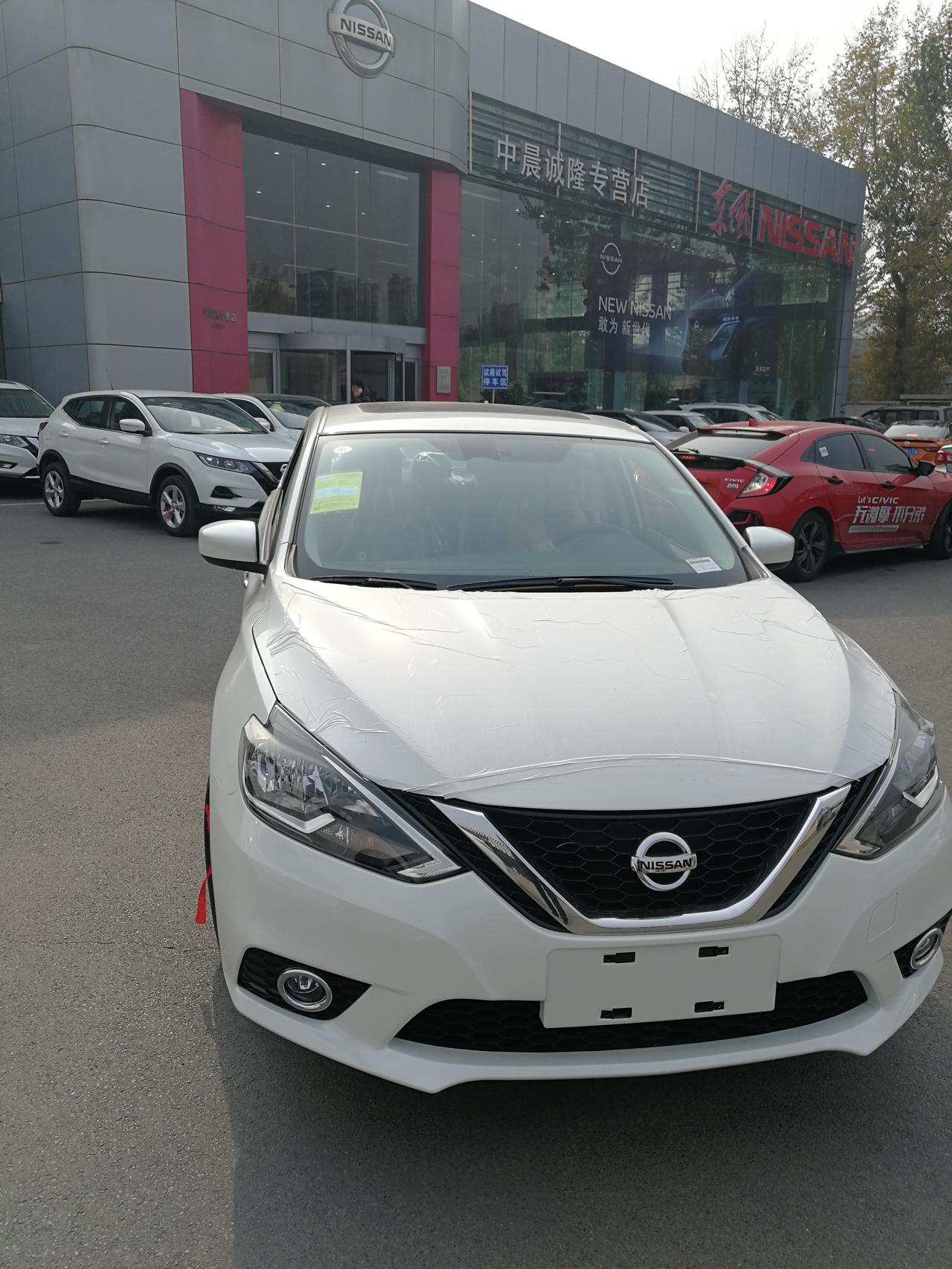 今天提了款2021 新轩逸经典1.6的车,当时谈好的赠品没写