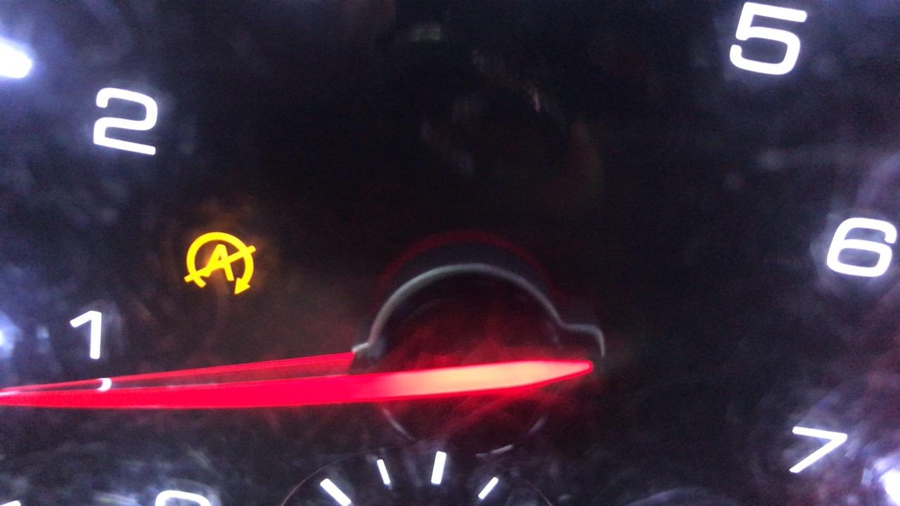 18款哈弗h6仪表盘上一直亮黄色圆圈里有个a和斜线是什么灯