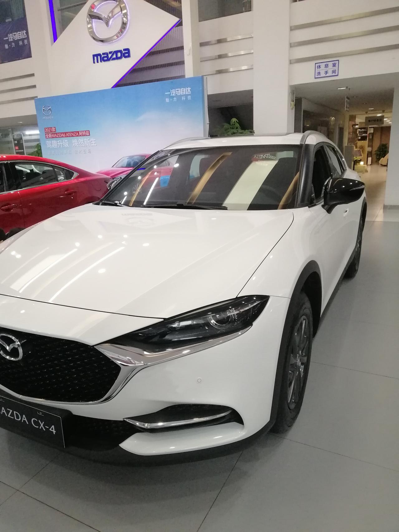 已买2021款马自达cx4白色活力版喜欢