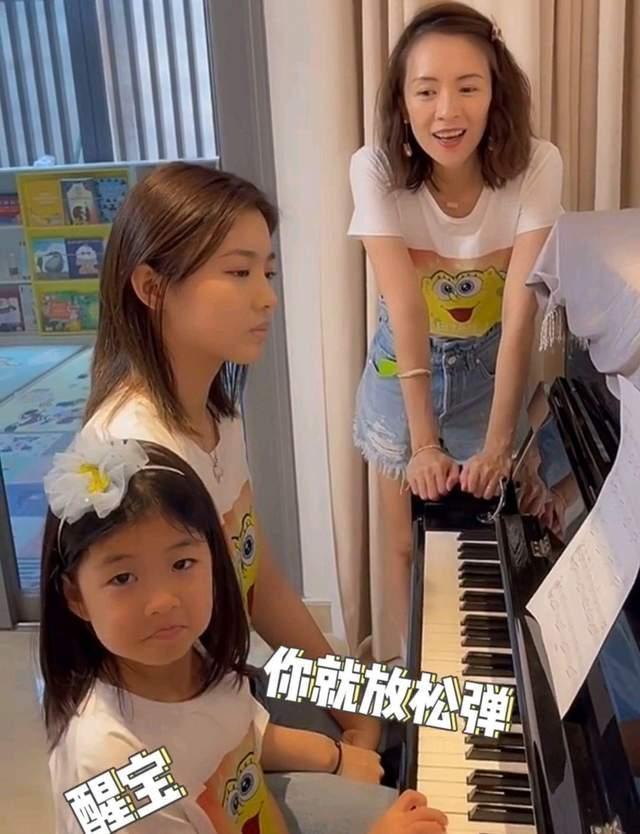 放弃撒贝宁又如何，嫁皮裤汪抚养继女，章子怡照样活成人生赢家