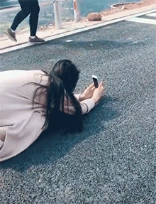 妹纸邪恶的GIF动态图：敬业的摄影师