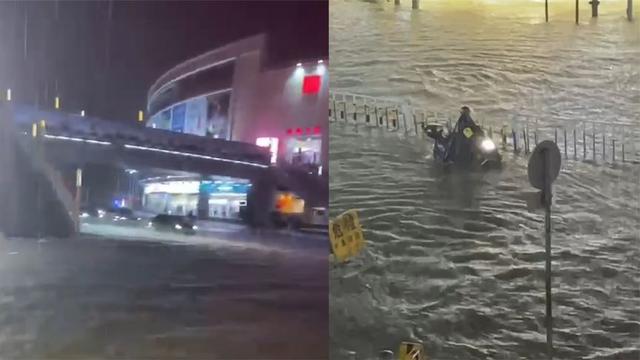 广东暴雨：街头积水市民骑车如渡河