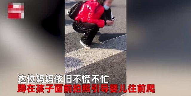 河北一女子将婴儿放在马路中央爬行，还得意拍照：玩得挺好，我还省事