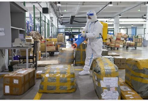 “双十一”你的快递在这“洗个澡”