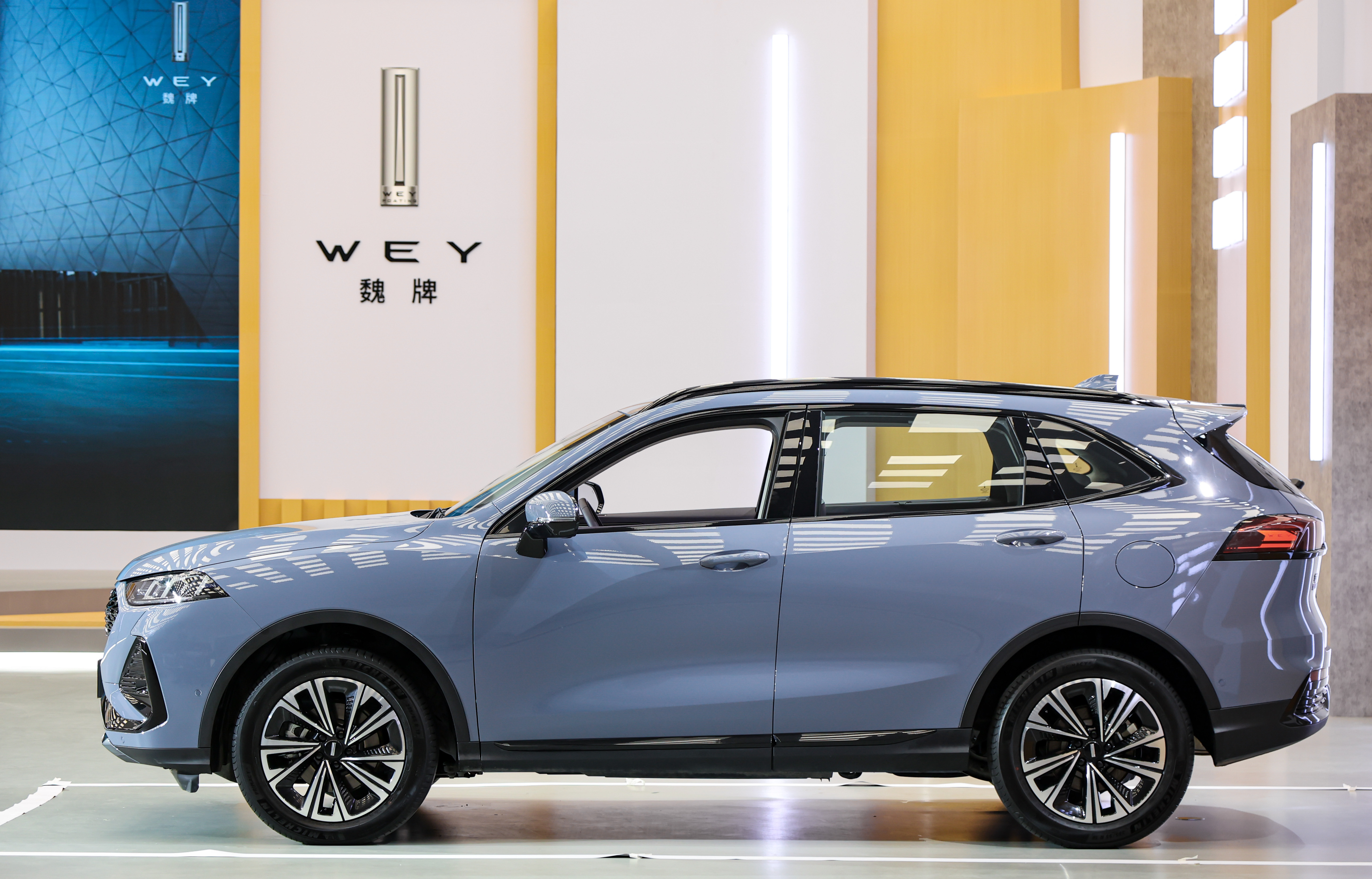 wey是什么品牌车(wey拿铁dht正式上市,售价15.98万元起)