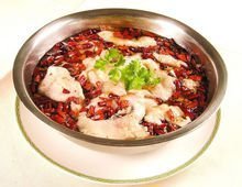 麻辣水煮鱼是川渝地区的一道色香味俱全的名肴，属于川菜或渝菜