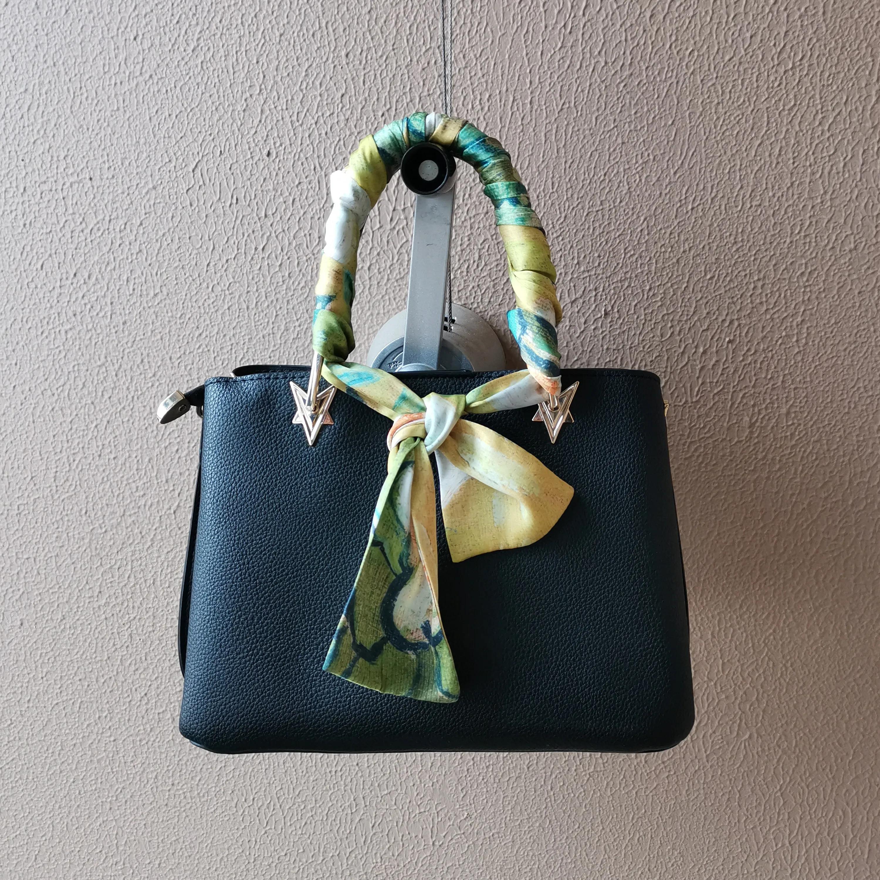 包包上的丝巾怎么系 -生活知识库-动动脑