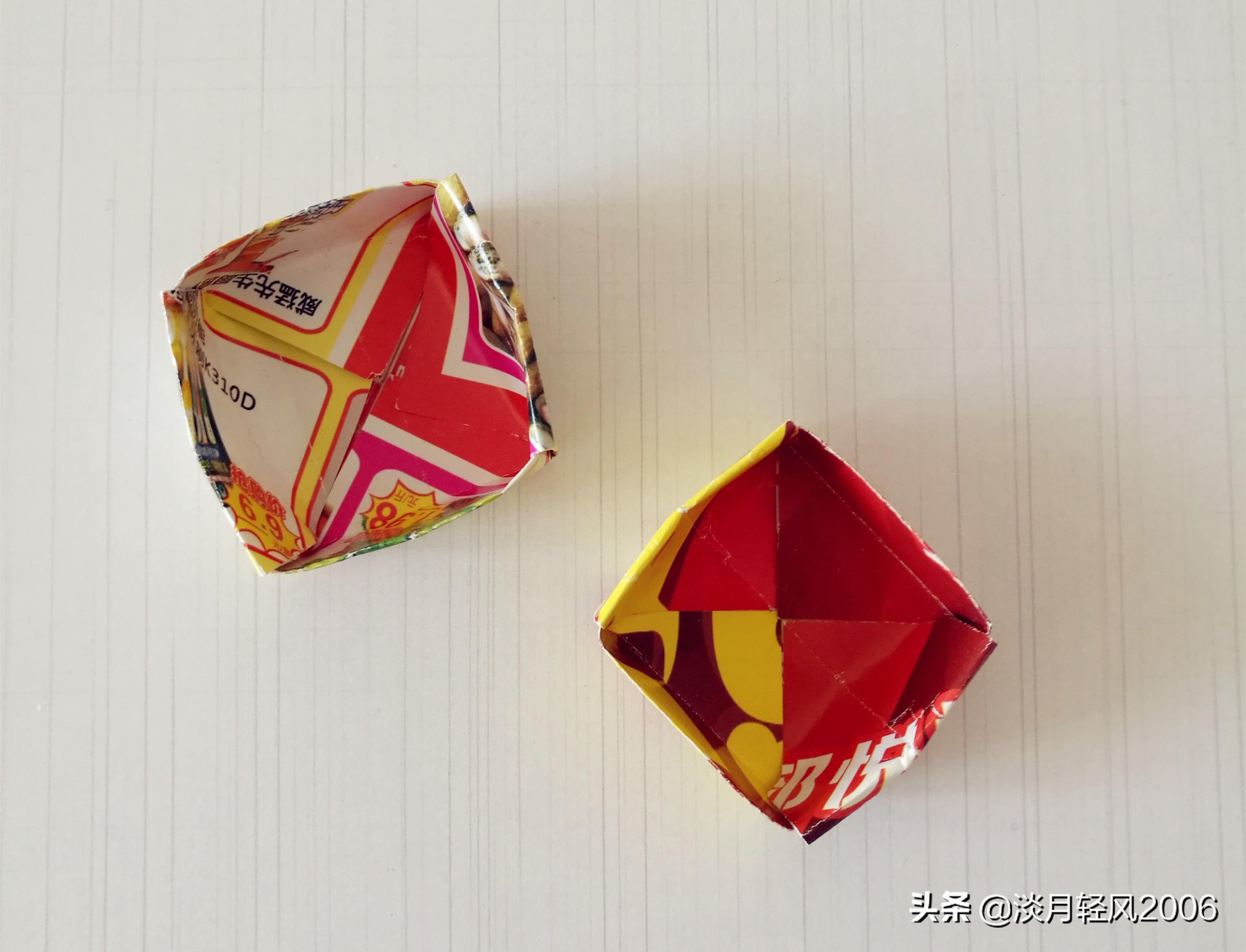 看完我们就可以折成这样的小盒子,吃零食时把垃圾装到这个小盒子里