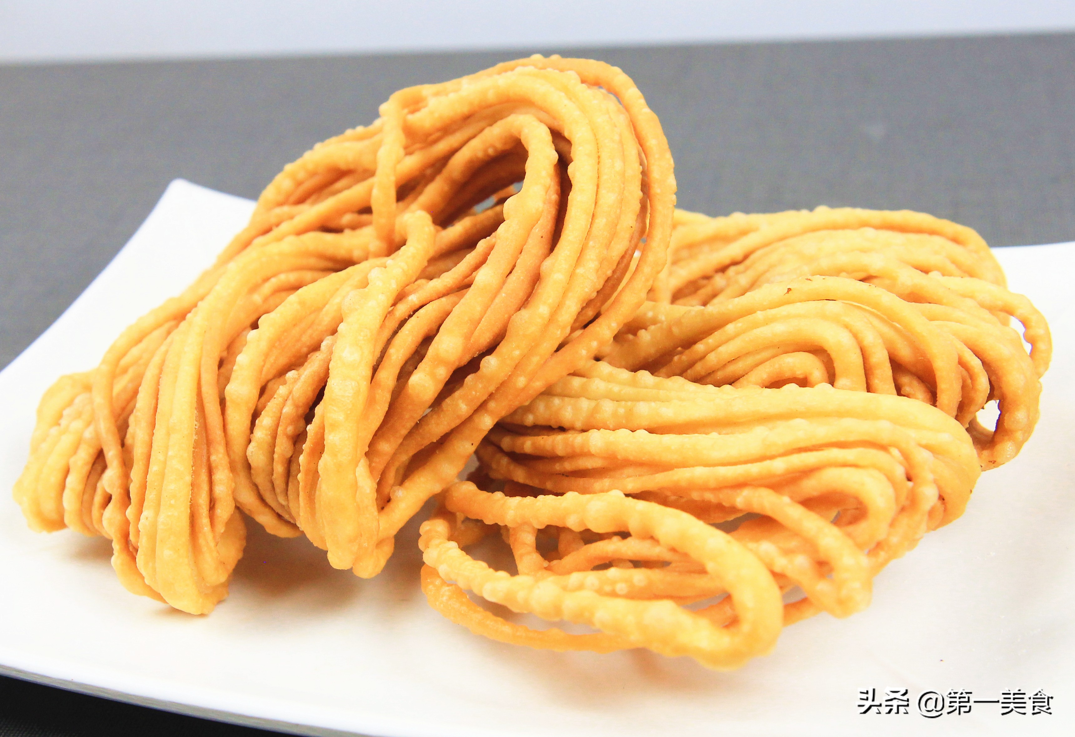 馓子是哪里的特产(河南特色小吃馓子,只要面饧好,制作无难度,筷子一拉