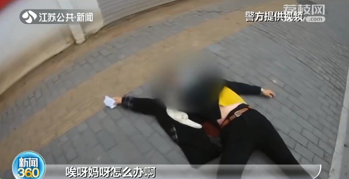 南京女子骑电动车不戴头盔 还撒泼袭警：我死了我愿意