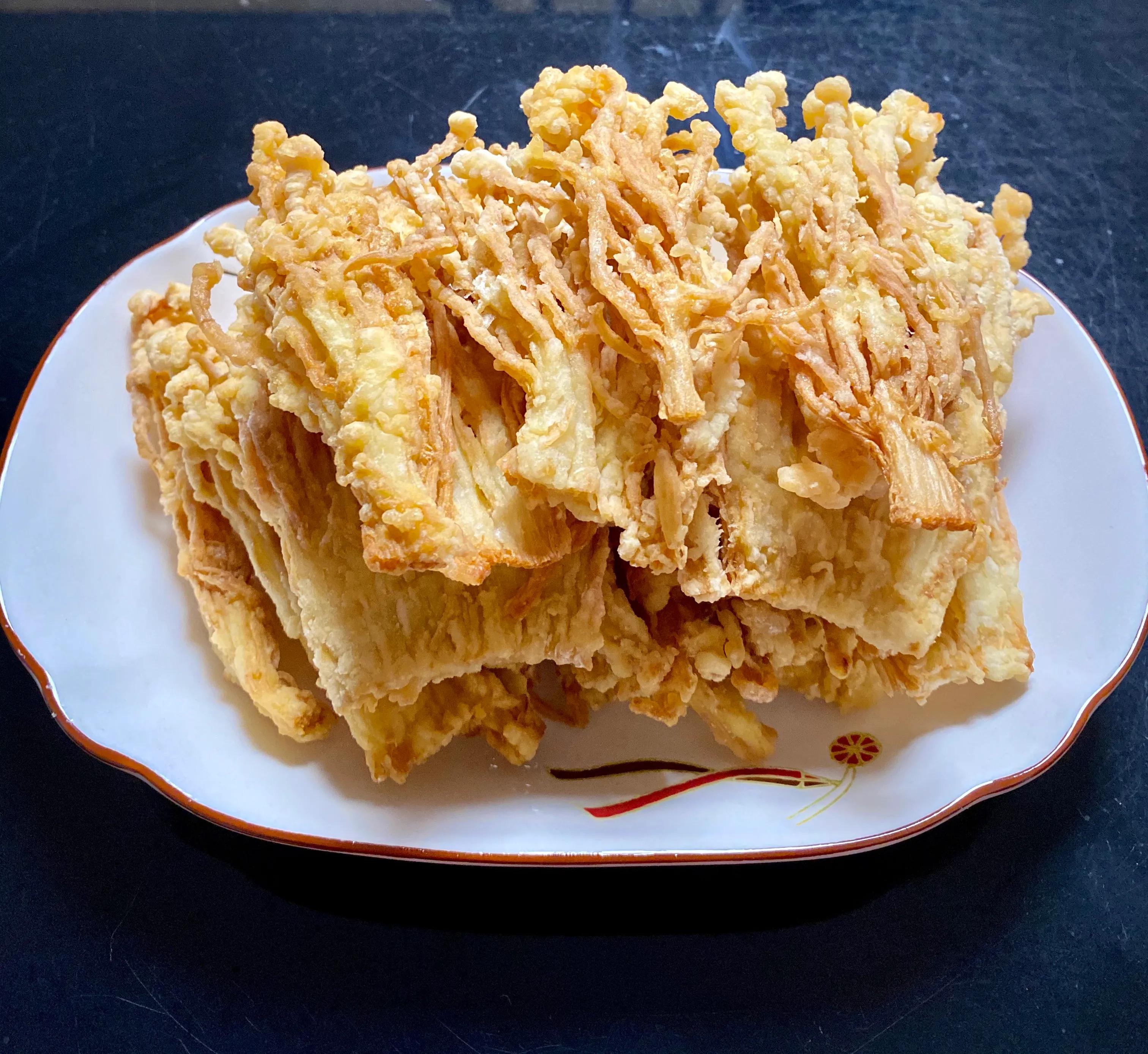 炸金针菇怎样做(手把手教你做出金黄酥脆的炸金针菇)