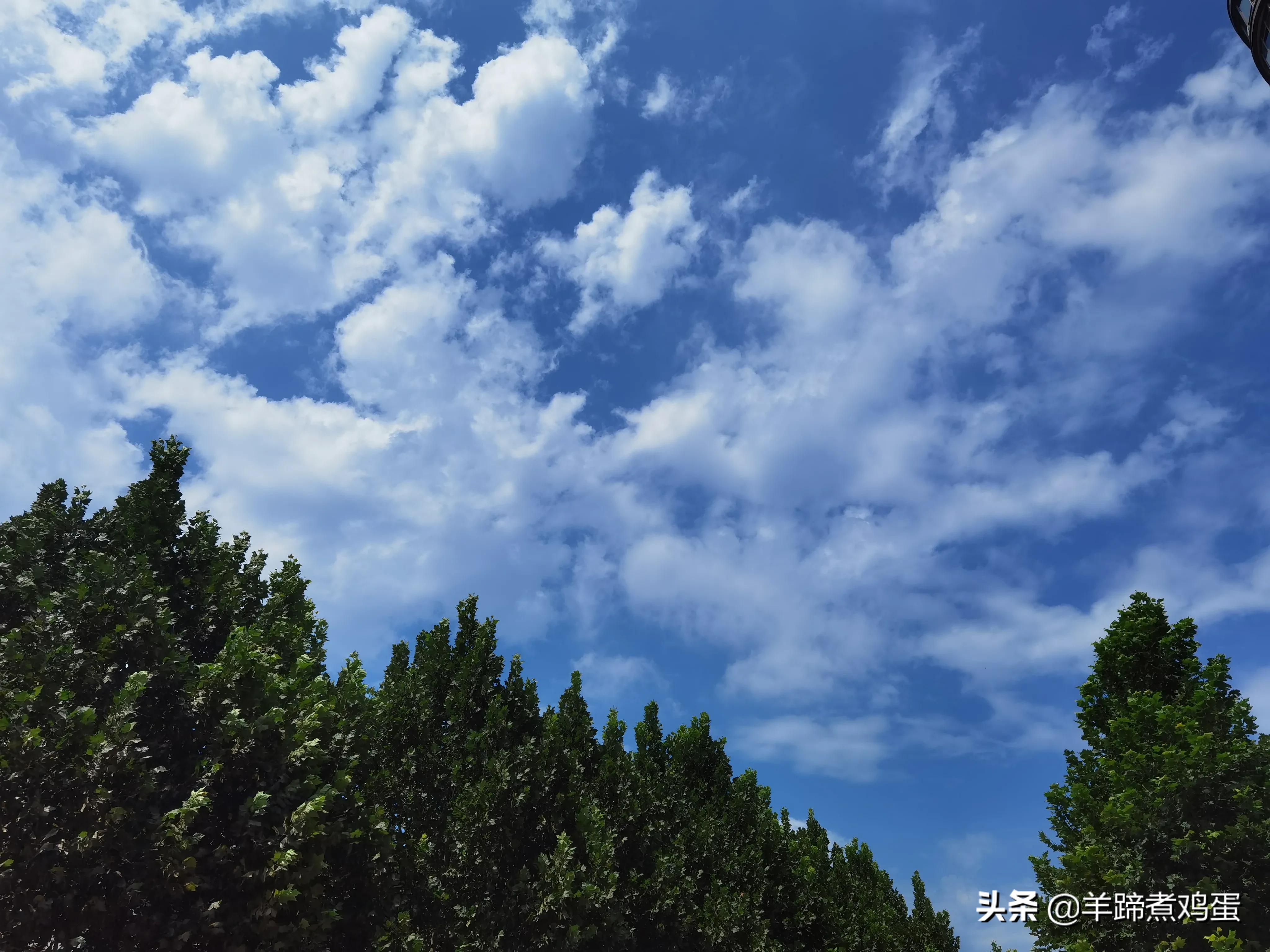 淫雨唤云行日隐耀霞红--雨后北京云空的美丽身影留下霞浓