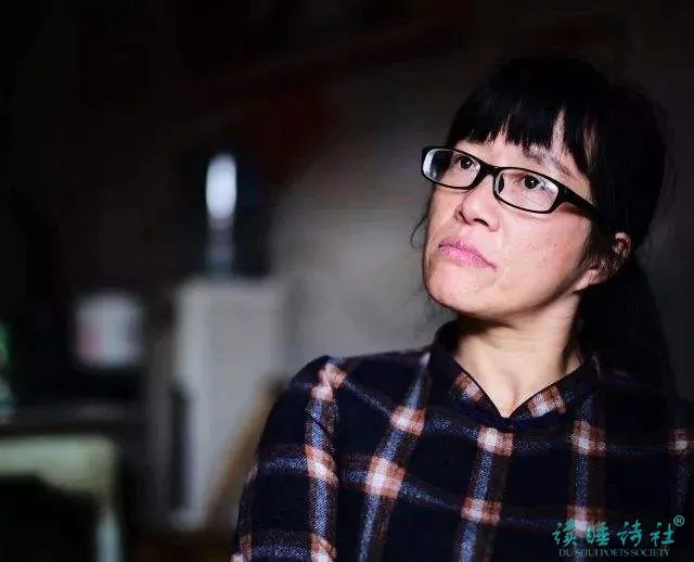 评读余秀华《就做一朵落败的花》