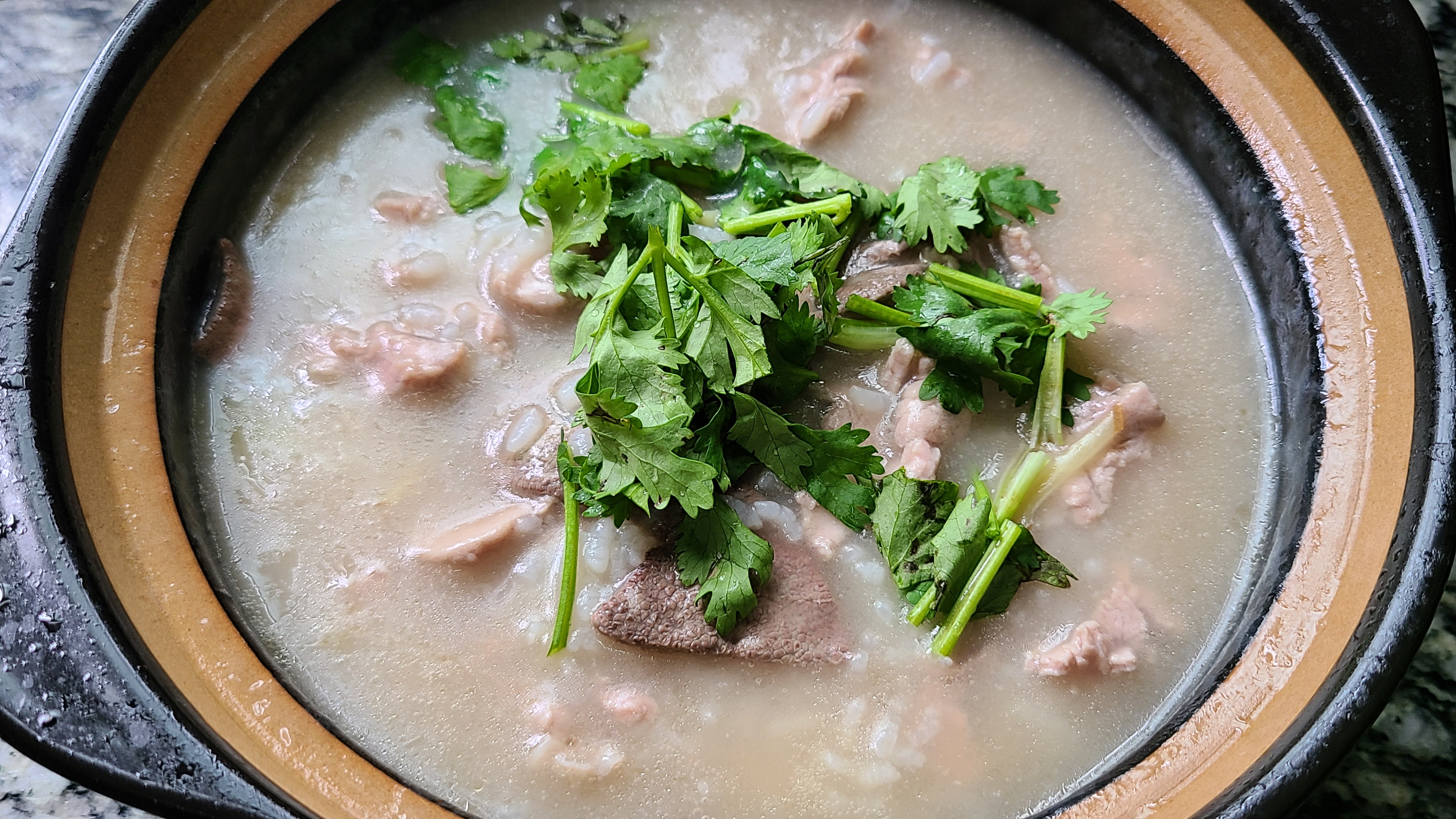 猪杂粥的做法窍门(鲜香美味的猪杂粥制作方法)