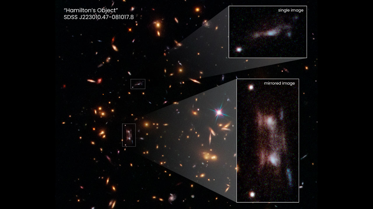 天文学家利用引力透镜发现一个遥远的星系