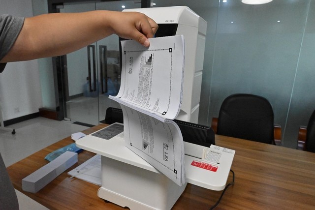 费时费力还不准 财务必备歌派GP580全自动装订机