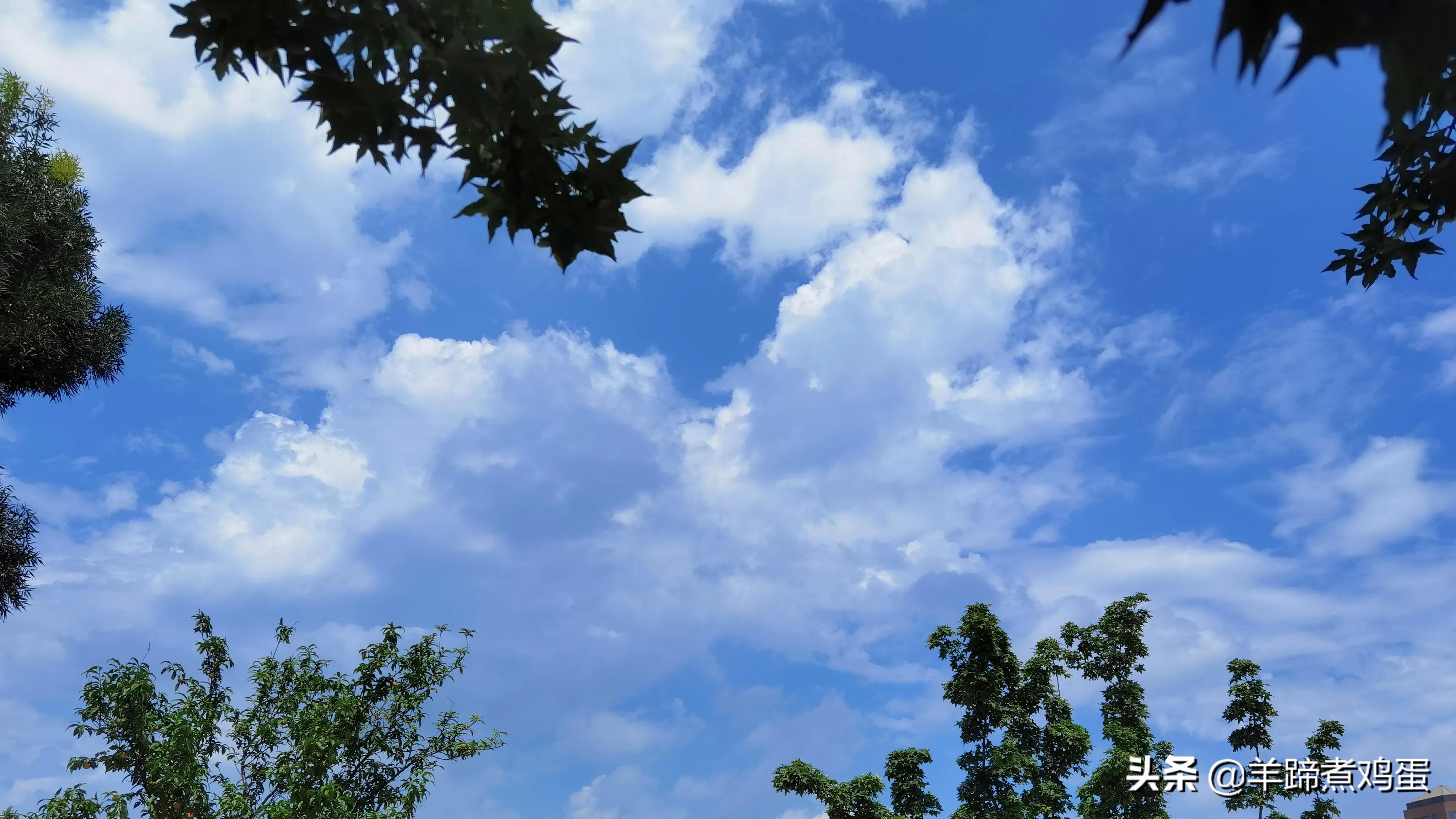 淫雨唤云行日隐耀霞红--雨后北京云空的美丽身影留下霞浓