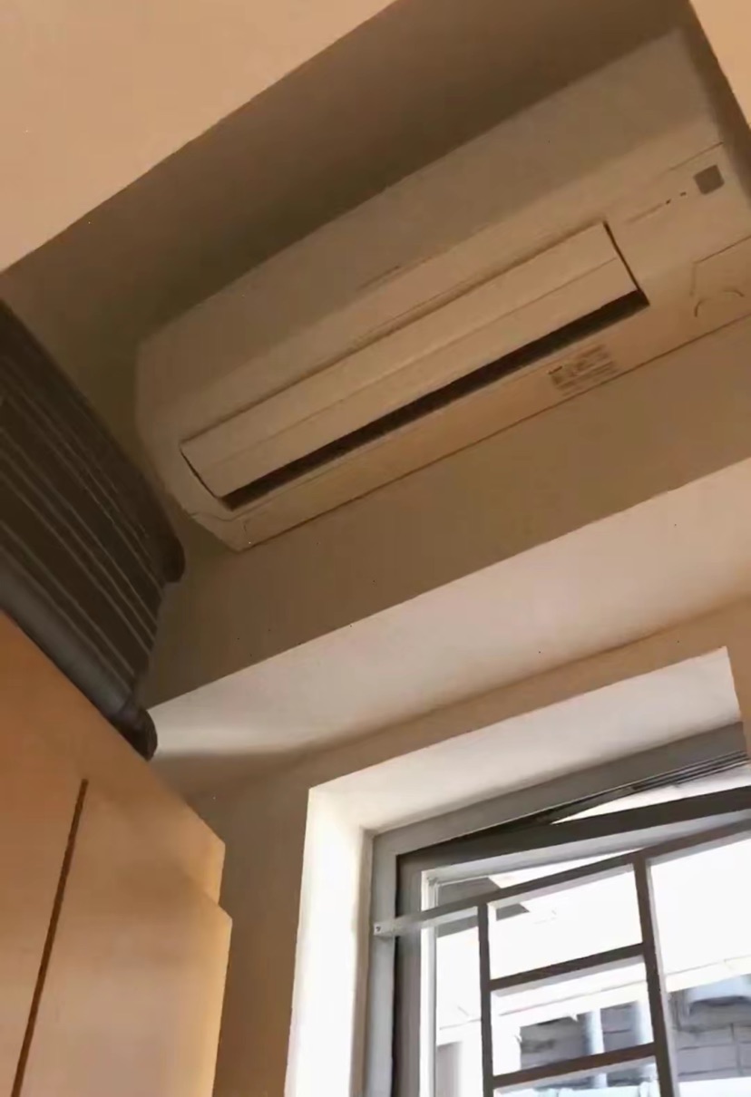 不足3㎡，香港菲佣睡在柜子上，却拥有独立的卫生间和空调