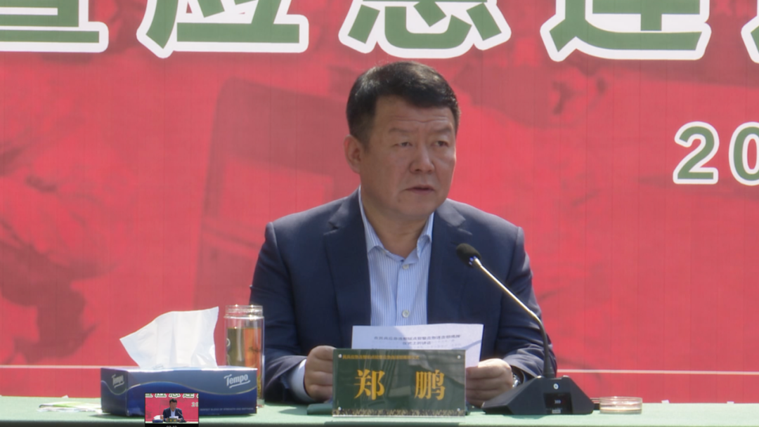 孝义市民兵应急连连部在鹏飞揭牌