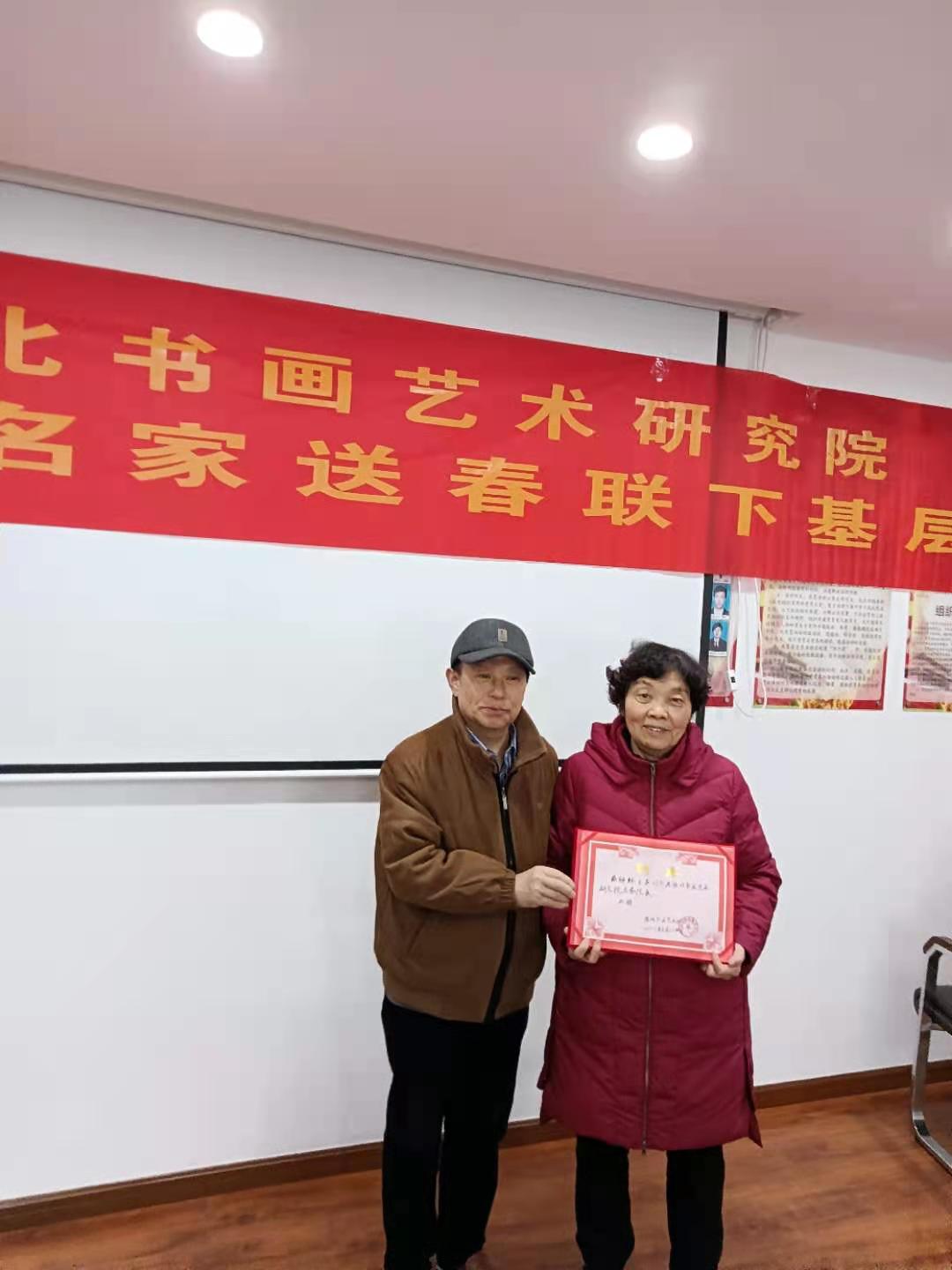 淮北书画艺术研究院书画名家送福进万家走进安徽安港律师事务所