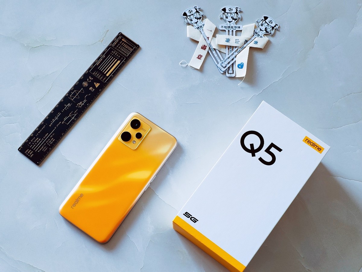 奥迪Q5车载音乐系统使用指南及realme真我Q5手机性价比分析