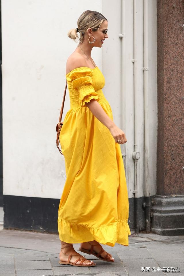 女星沃格·威廉姆斯现身伦敦街头，她的优雅让人着迷