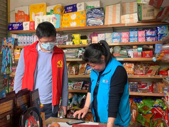 经开志愿红敲开群众“心门”，把牢疫情防控“安全门”